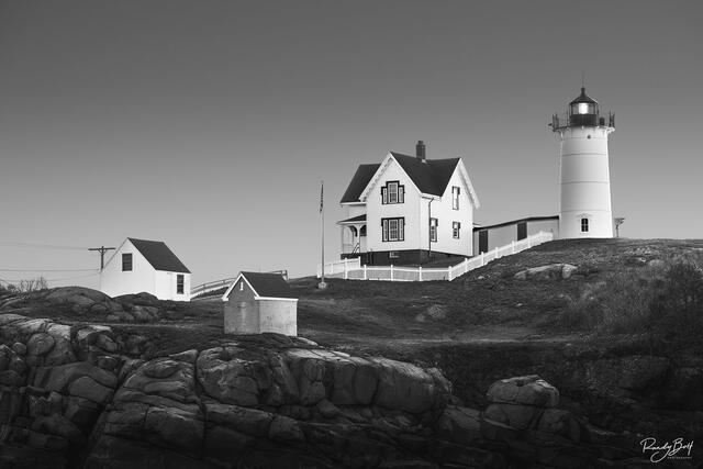black and white image of the Nubble Lighthouse in York, Maine also known as Cape Neddick Lighthouse.
