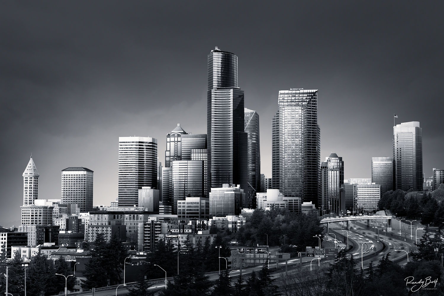 Becoming Gotham black and white photograph of Seattle from the Jose Rizal Bridge.