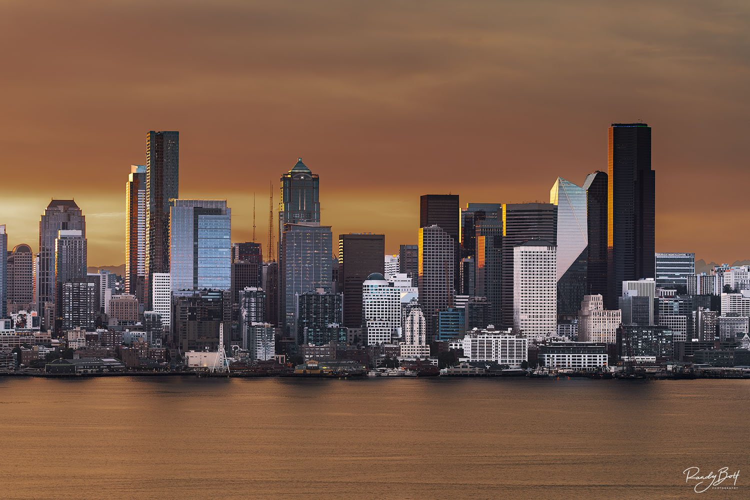 City Sunrise sunrise over Downtown Seattle from Alki beach