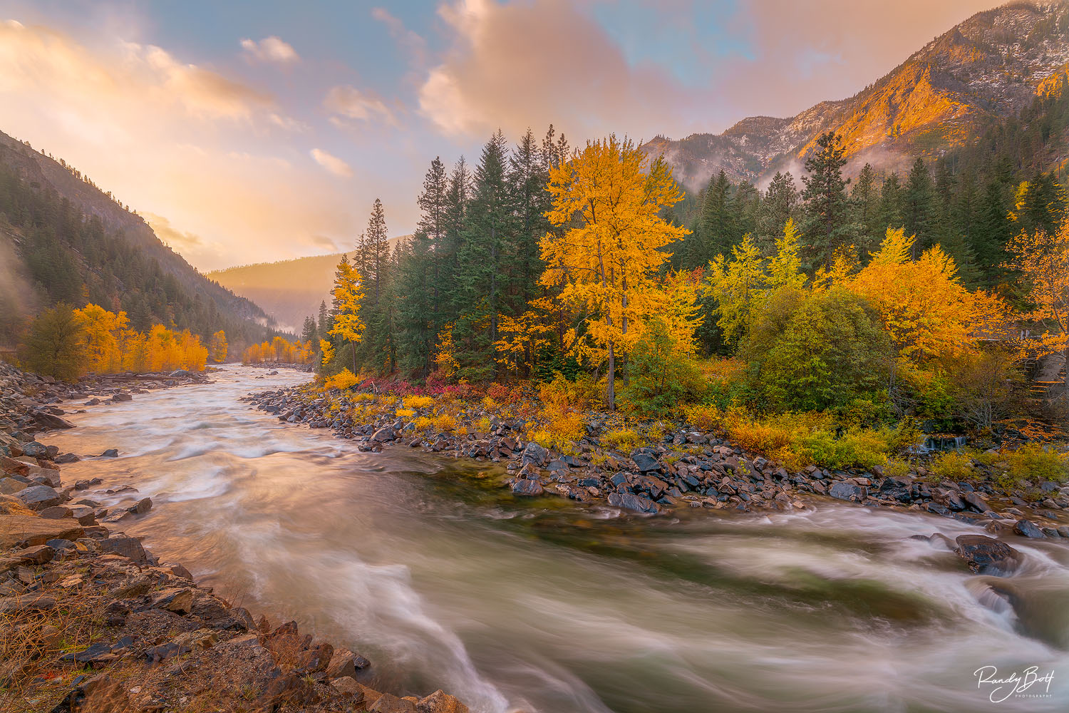 Light rays and fall color in the Tumwater Canyon near Leavenworth, Washington.
