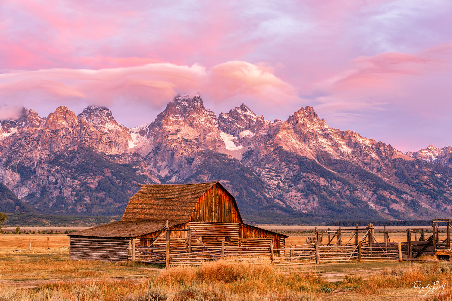sunrise over the Moulton Barn in mormon row near the grand Tetons, Wyoming