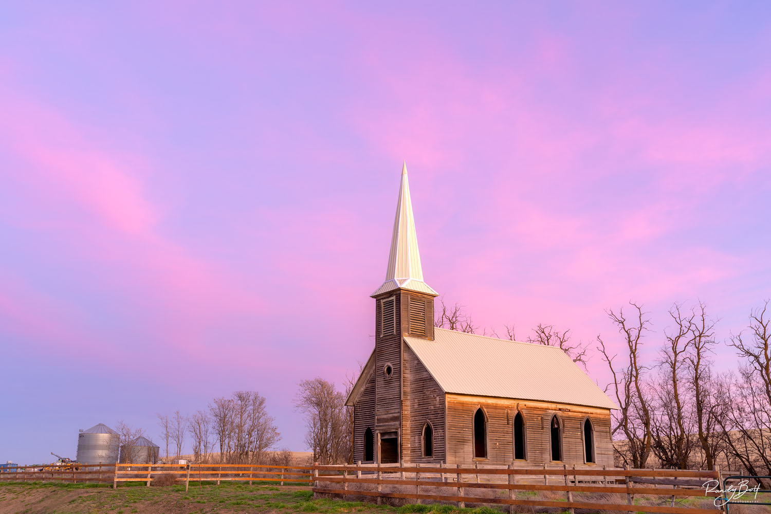 Pastel Sunset Locust grove church in Oregon with pastel pink clouds at sunset