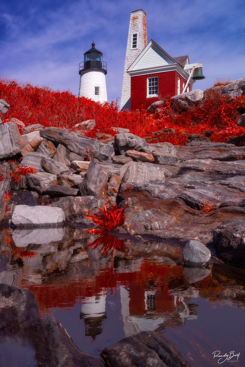 Pemaquid Chrome Pemaquid lighthouse in IR chrome infrared reflecting through a small pool of rain water.