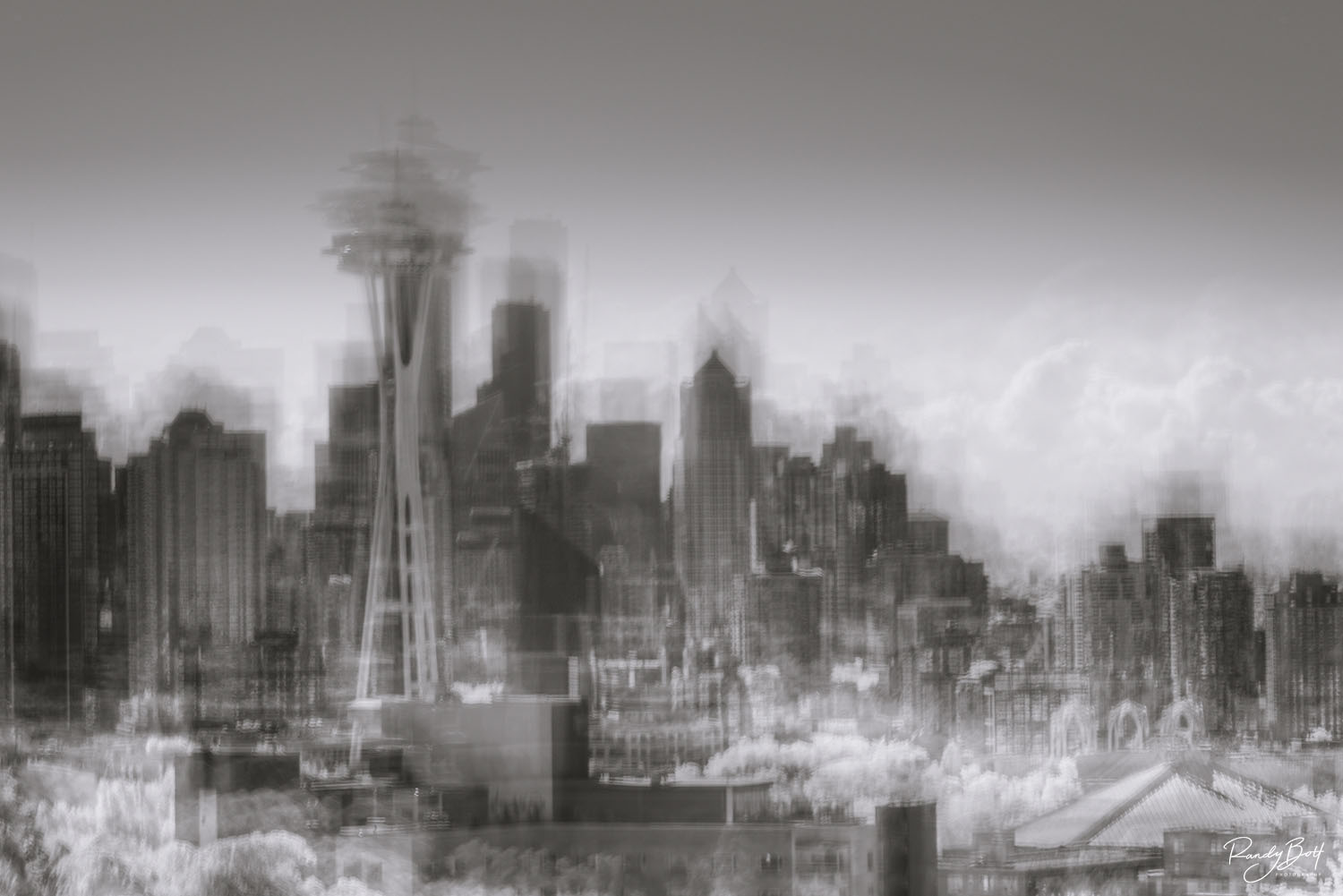 Shockwave black and white photograph taken from Kerry Park in Seattle showcases a mesmerizing portrayal of the cityscape, using intentional camera movement.